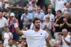 华体会官方平台下载-英国网球队轻取世界网球队，费德勒完成帽子戏法